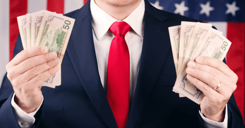 Man in suite holding money